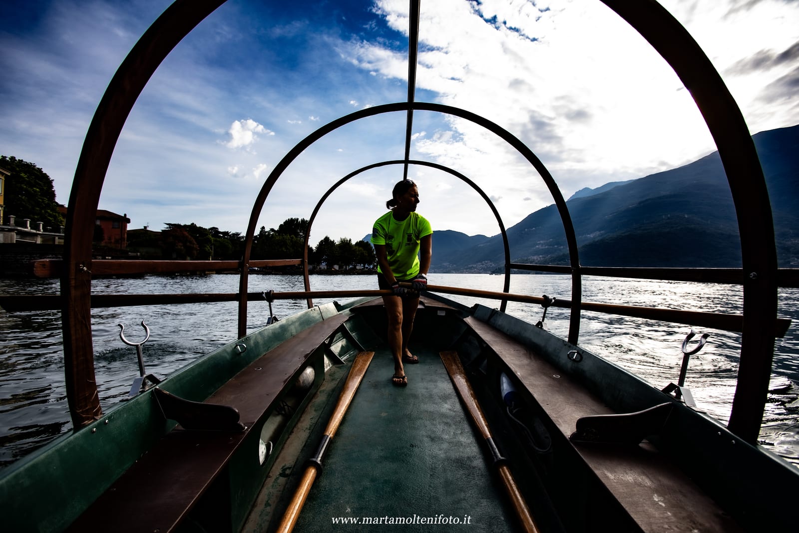 Vintage varnished wooden boat on an Italian lake